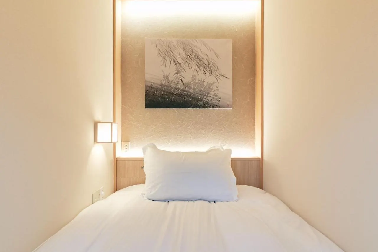 ** Капсульный отель Hotel Zen Токио Япония